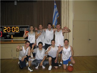 Members of The Islanders celebrate their second consecutive Greek League Regular Season and Tournament Championship.
